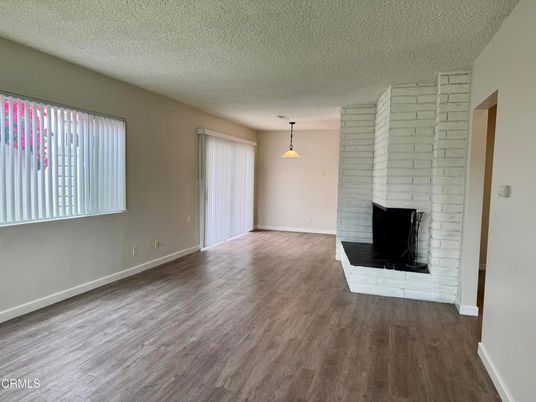 Empty room, Fireplace, Interior, Pendant Lights, Wood Texture Flooring