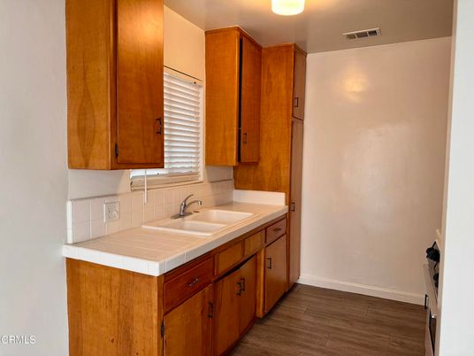 Interior, Kitchen, Tile Countertops, Wood Texture Flooring