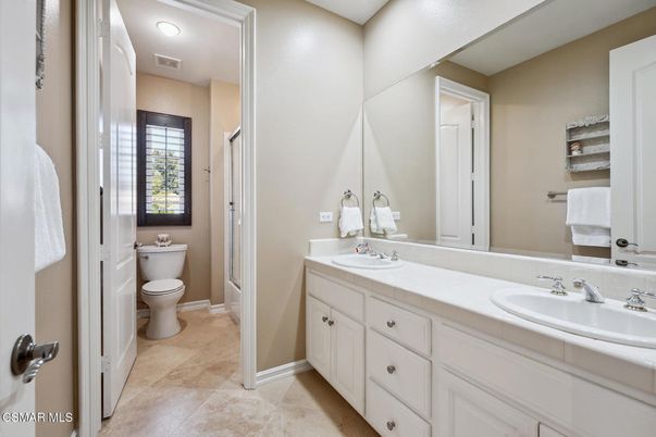 Bathroom, Dual Sink Vanities, Interior, Recessed Lighting, Tile Countertops