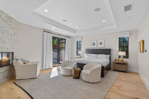 Bedroom, Fireplace, Interior, Recessed Lighting, Stone Walls, Wood Texture Flooring
