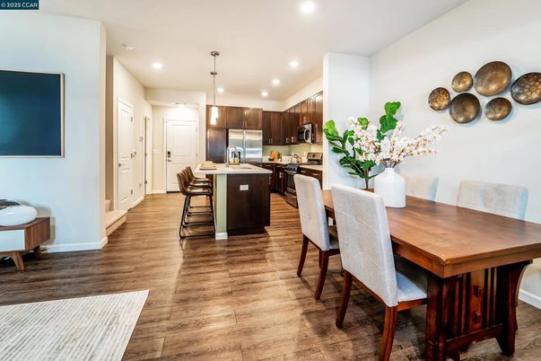 Dining room, Interior, Kitchen, Pendant Lights, Recessed Lighting, Stainless Steel Appliances, Wood Texture Flooring