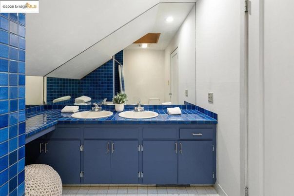 Bathroom, Dual Sink Vanities, Interior, Recessed Lighting, Tile Countertops