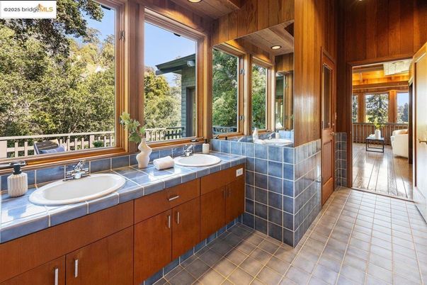 Bathroom, Dual Sink Vanities, Interior, Recessed Lighting, Tile Countertops, Wood Texture Flooring, Wooden Walls