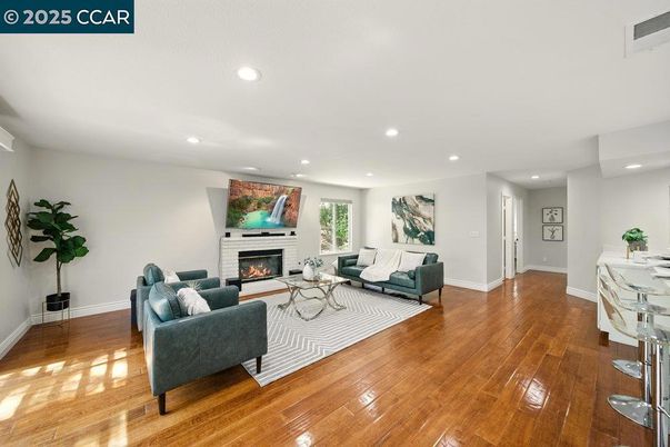 Fireplace, Interior, Living room, Recessed Lighting, Wood Texture Flooring