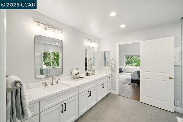 Bathroom, Dual Sink Vanities, Interior, Recessed Lighting, Wood Texture Flooring