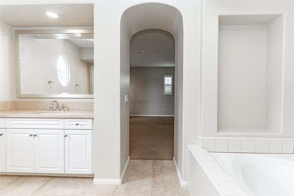 Bathroom, Dual Sink Vanities, Interior, Recessed Lighting, Tile Countertops