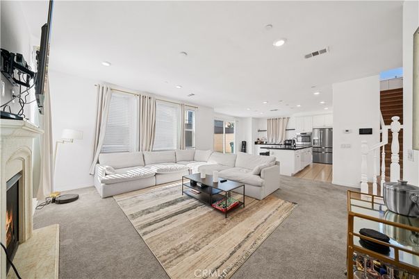 Fireplace, Interior, Kitchen, Living room, Recessed Lighting, Stainless Steel Appliances
