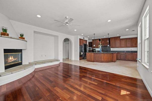 Empty room, Fireplace, Interior, Kitchen, Recessed Lighting, Wood Texture Flooring