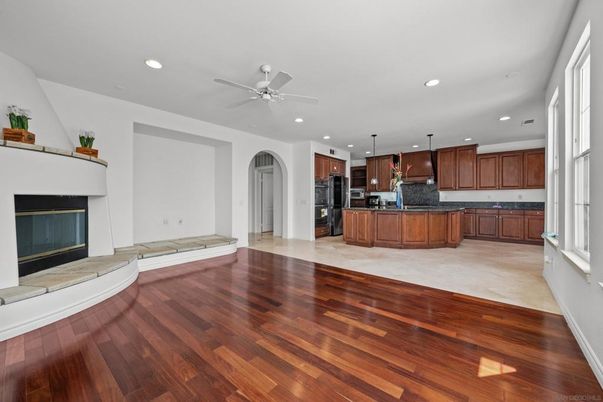 Empty room, Fireplace, Interior, Kitchen, Recessed Lighting, Wood Texture Flooring