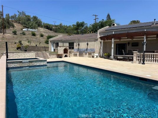 Exterior, Pool, Solar Panels