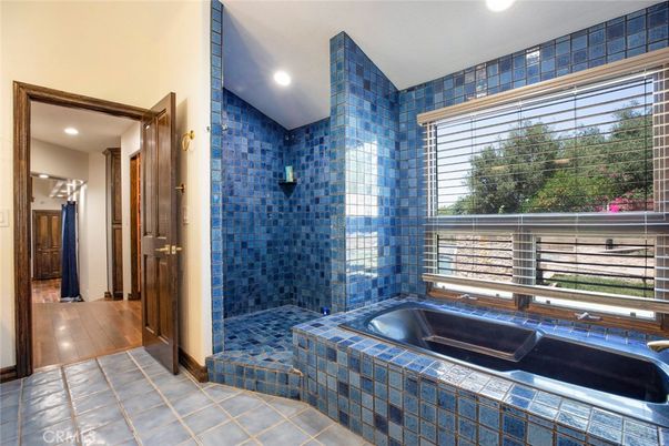 Bathroom, Glass Shower, Interior, Recessed Lighting, Tile Countertops, Wood Texture Flooring