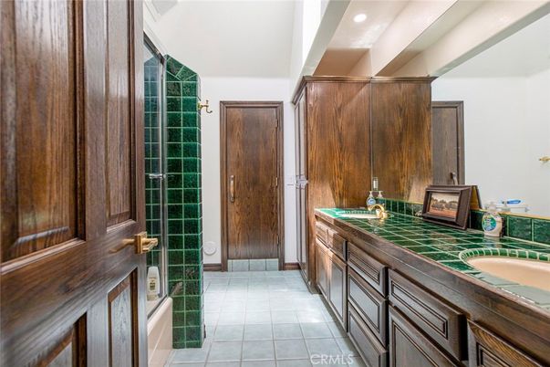 Bathroom, Dual Sink Vanities, Interior, Recessed Lighting, Tile Countertops