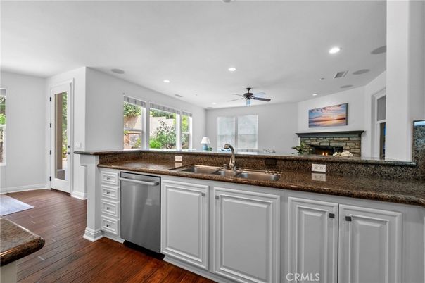 Fireplace, Interior, Kitchen, Recessed Lighting, Wood Texture Flooring