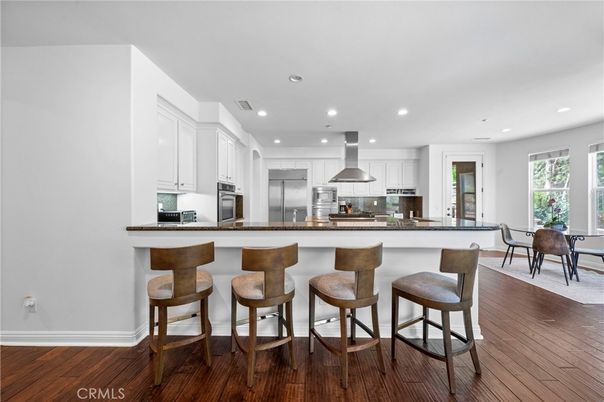 Dining room, Interior, Kitchen, Recessed Lighting, Stainless Steel Appliances, Wood Texture Flooring