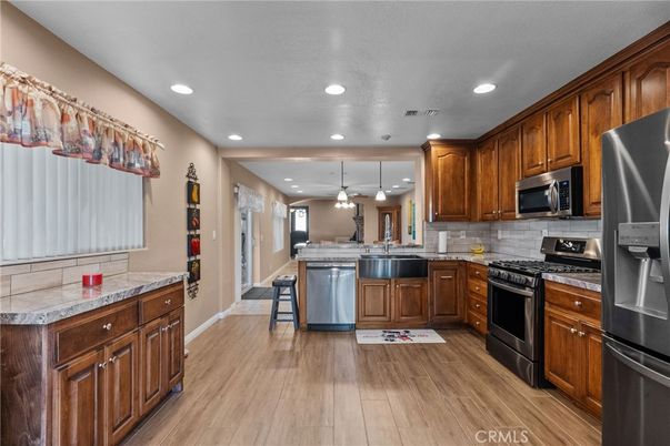 Interior, Kitchen, Pendant Lights, Recessed Lighting, Stainless Steel Appliances, Wood Texture Flooring