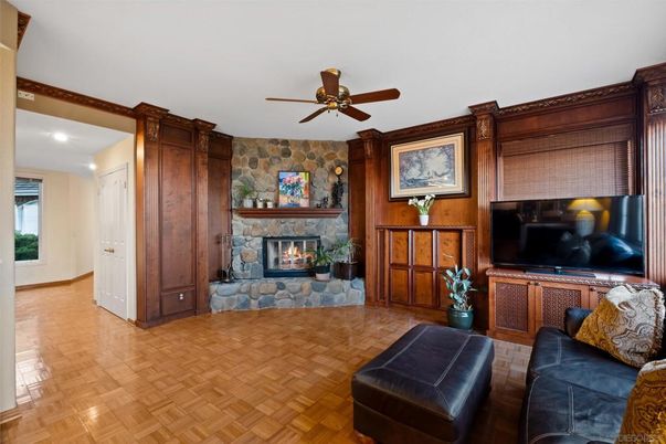 Fireplace, Interior, Living room, Recessed Lighting, Stone Walls, Wood Texture Flooring