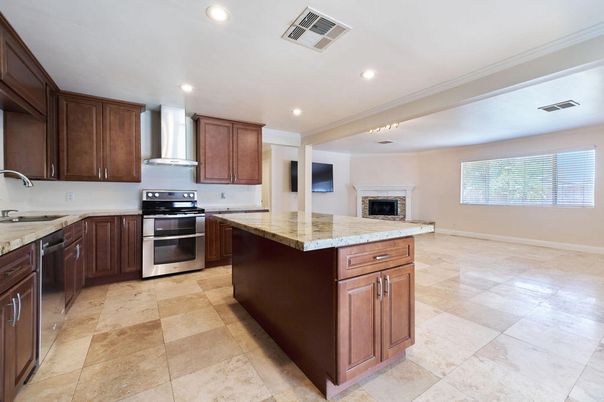 Fireplace, Interior, Kitchen, Recessed Lighting, Stainless Steel Appliances