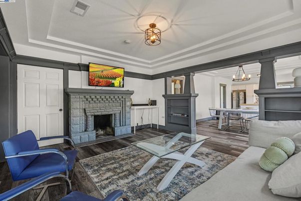Chandelier, Dining room, Fireplace, Interior, Pendant Lights, Wood Texture Flooring