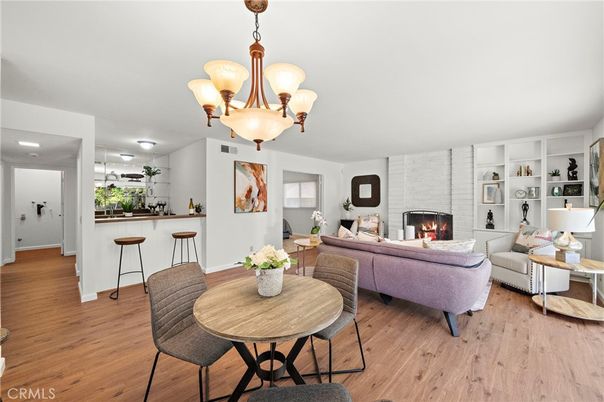 Chandelier, Dining room, Fireplace, Interior, Living room, Recessed Lighting, Wood Texture Flooring