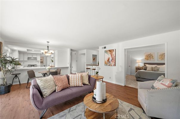 Chandelier, Dining room, Interior, Kitchen, Living room, Recessed Lighting, Stainless Steel Appliances, Wood Texture Flooring