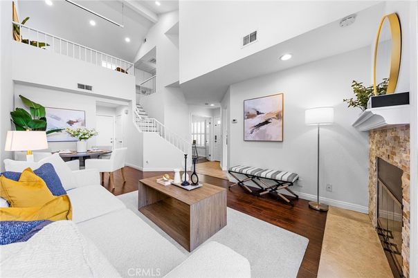Dining room, Fireplace, Interior, Living room, Recessed Lighting, Wood Texture Flooring