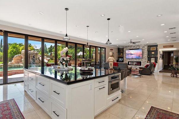 Dining room, Fireplace, Interior, Kitchen, Living room, Pendant Lights, Recessed Lighting, Stone Walls