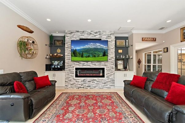 Fireplace, Interior, Living room, Recessed Lighting, Stone Walls, Wood Texture Flooring