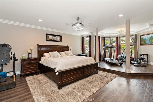 Bedroom, Chandelier, Fitness Equipment, Interior, Recessed Lighting, Wood Texture Flooring