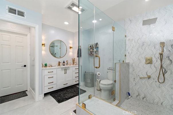 Bathroom, Dual Sink Vanities, Glass Shower, Interior, Marble Walls, Recessed Lighting