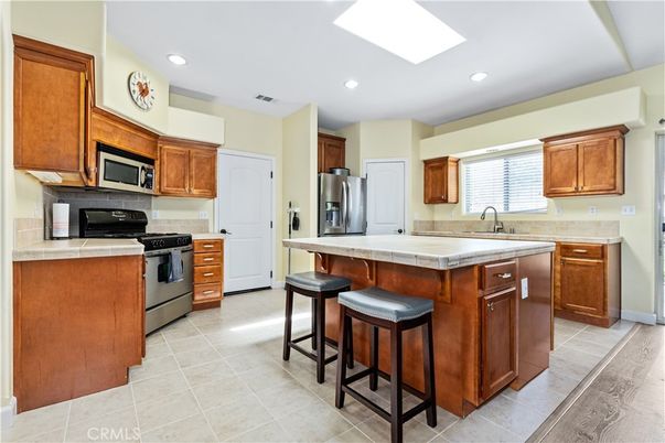 Interior, Kitchen, Recessed Lighting, Stainless Steel Appliances, Tile Countertops