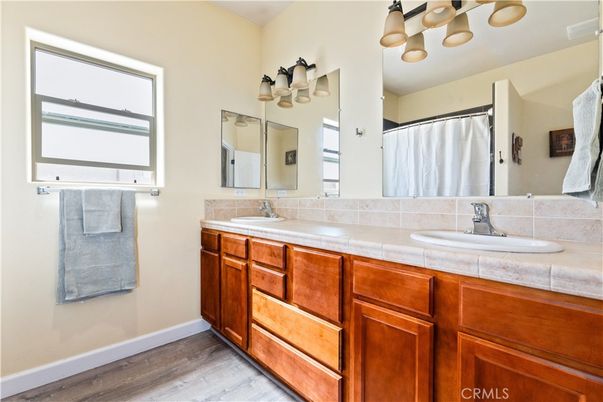 Bathroom, Dual Sink Vanities, Interior, Tile Countertops, Wood Texture Flooring