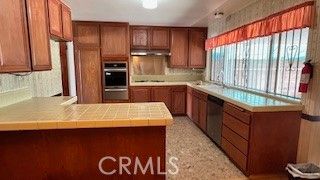 Interior, Kitchen, Stainless Steel Appliances, Tile Countertops