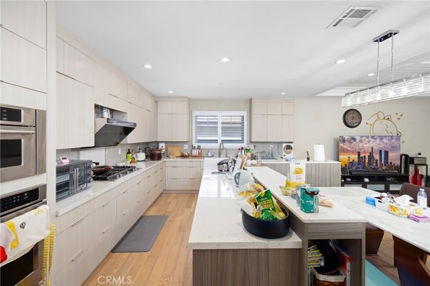 Interior, Kitchen, Pendant Lights, Recessed Lighting, Stainless Steel Appliances, Wood Texture Flooring