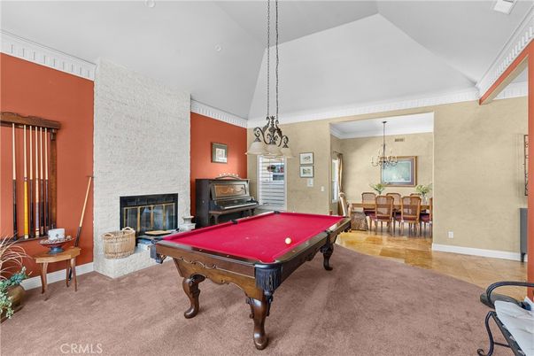 Billiard Table, Chandelier, Dining room, Fireplace, Game Room, Interior, Pendant Lights