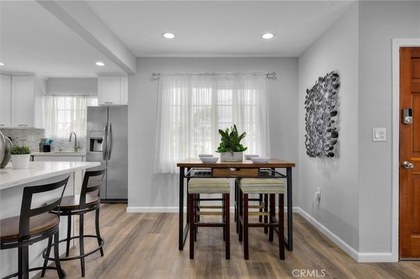 Dining room, Interior, Kitchen, Recessed Lighting, Stainless Steel Appliances, Wood Texture Flooring