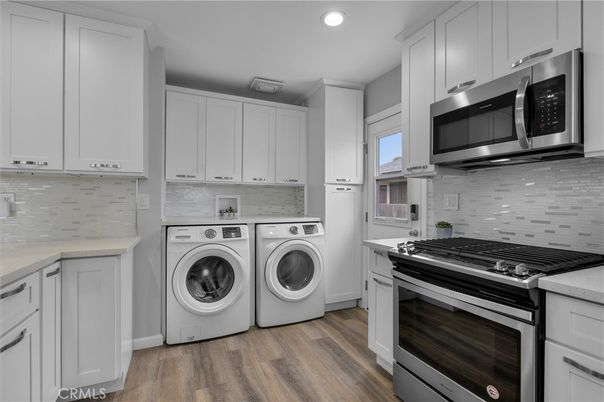 Interior, Kitchen, Recessed Lighting, Stainless Steel Appliances, Washer, Wood Texture Flooring