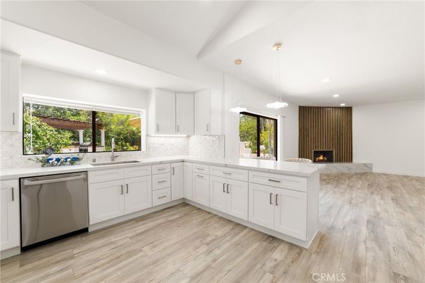 Fireplace, Interior, Kitchen, Pendant Lights, Recessed Lighting, Stainless Steel Appliances, Wood Texture Flooring