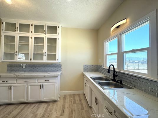 Interior, Kitchen, Tile Countertops, Wood Texture Flooring