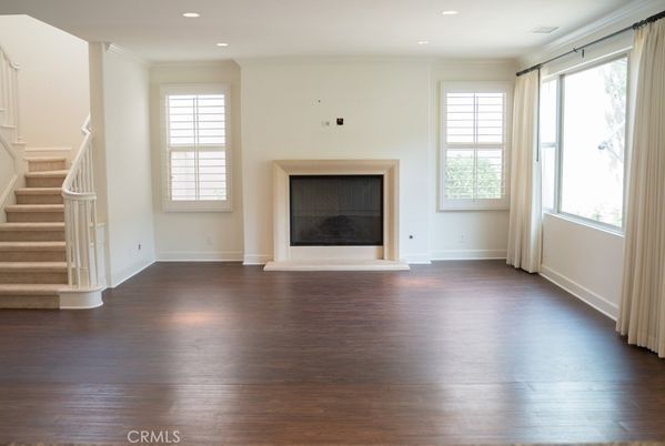 Empty room, Fireplace, Interior, Recessed Lighting, Wood Texture Flooring