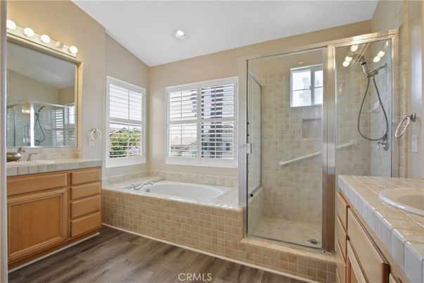 Bathroom, Glass Shower, Interior, Recessed Lighting, Tile Countertops, Wood Texture Flooring