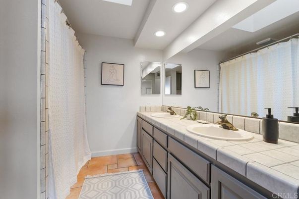 Bathroom, Dual Sink Vanities, Interior, Recessed Lighting, Tile Countertops