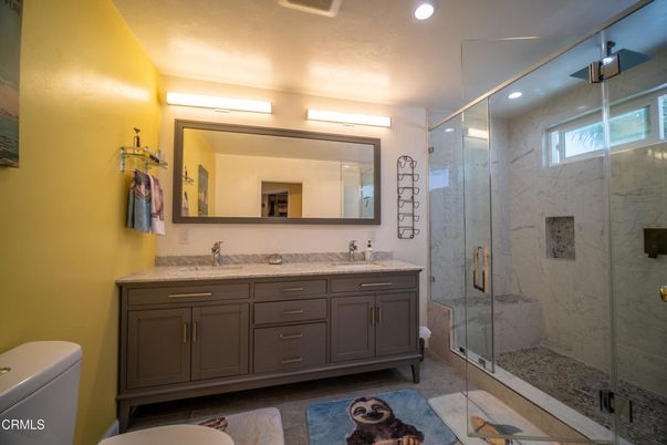 Bathroom, Dual Sink Vanities, Glass Shower, Interior, Marble Walls, Recessed Lighting