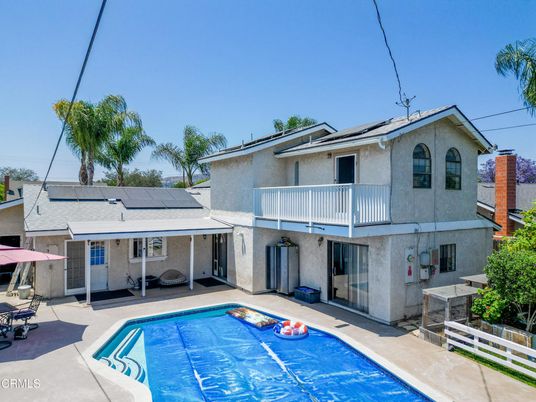 Exterior, Pool, Solar Panels