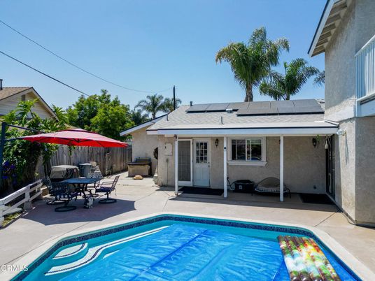 Exterior, Pool, Solar Panels