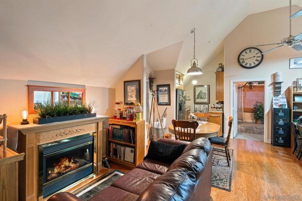 Dining room, Fireplace, Interior, Living room, Pendant Lights, Wood Texture Flooring