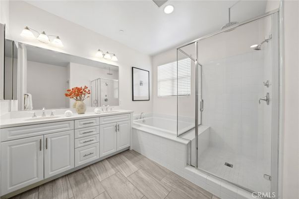 Bathroom, Dual Sink Vanities, Glass Shower, Interior, Recessed Lighting, Wood Texture Flooring
