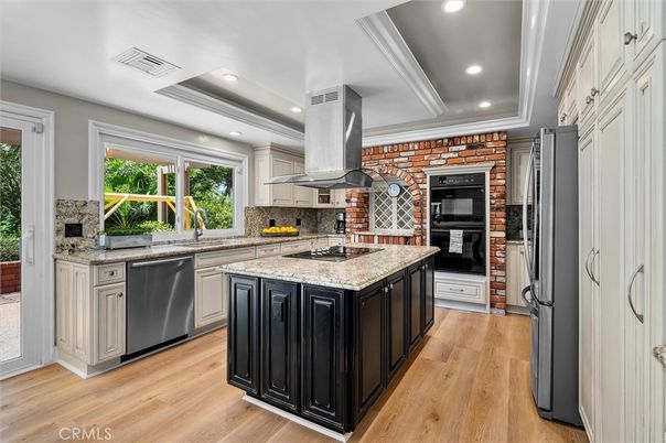 Interior, Kitchen, Recessed Lighting, Stainless Steel Appliances, Stone Walls, Wood Texture Flooring