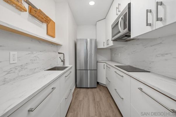 Interior, Kitchen, Marble Walls, Recessed Lighting, Wood Texture Flooring