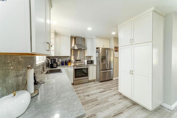 Interior, Kitchen, Recessed Lighting, Stainless Steel Appliances, Wood Texture Flooring