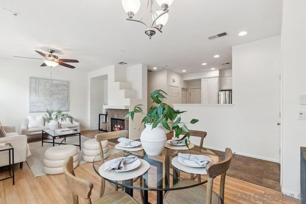 Dining room, Fireplace, Interior, Living room, Recessed Lighting, Wood Texture Flooring